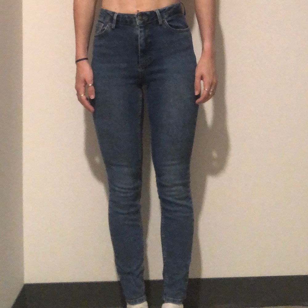 Blue subdued skinny high waist jeans. Size 27